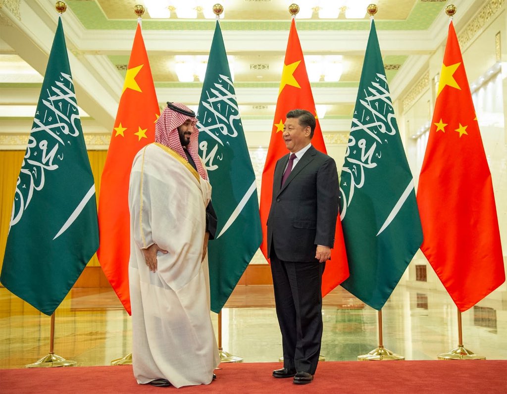 Mohammad Bin Salman and Xi Jinping meeting at a diplomatic conference.