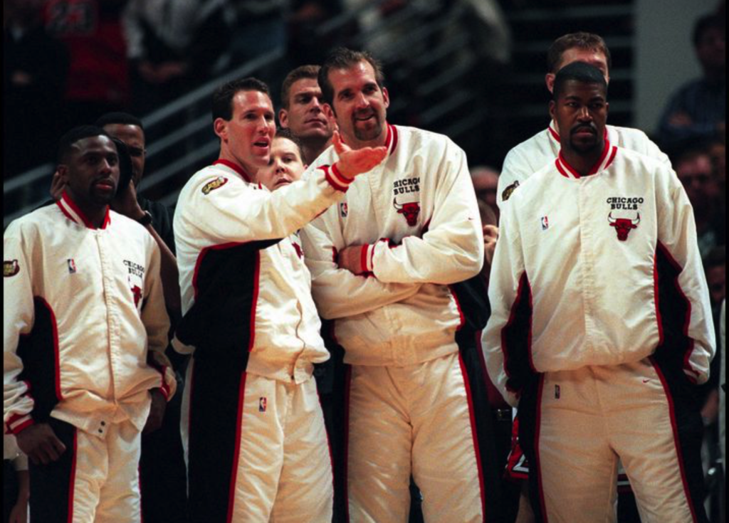 Chicago Bulls bench player react to something happening on-court.